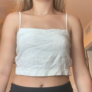 White crop top with buttons on side